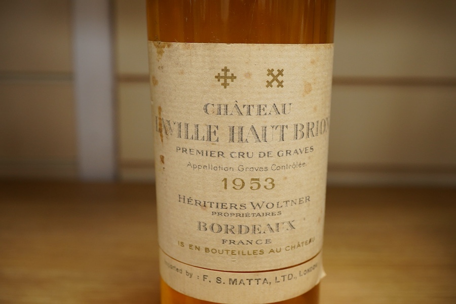 A bottle of Chateau Haut Brion, 1953, imported by FS Matta, London